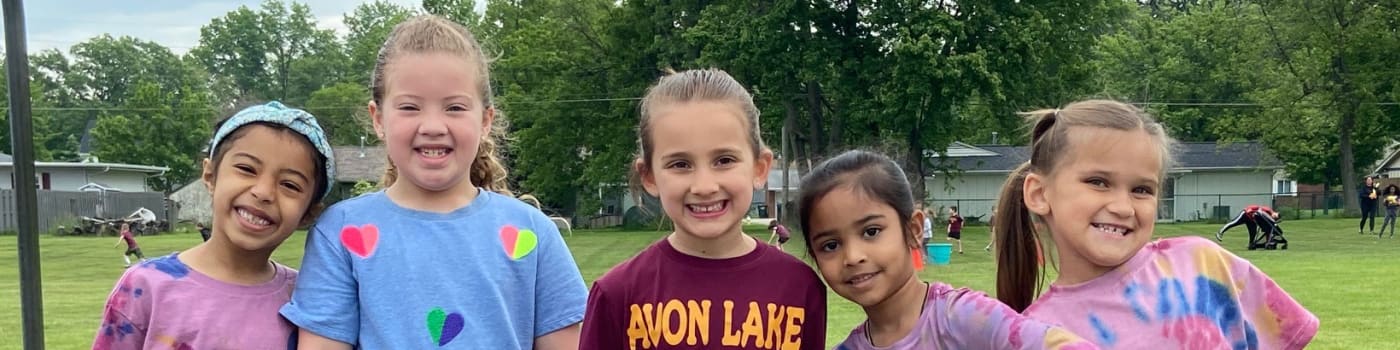 Children smiling during Field Day