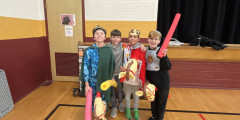 Erieview fourth graders during a pretend jousting activity 
