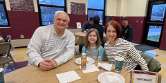 Westview student with family members at breakfast