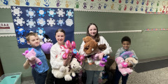 Westview students hold donated stuffed animals